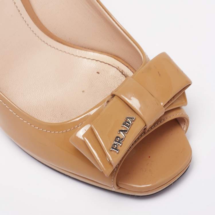 Pre Owned Prada Beige Patent Leather Bow Peep-Toe Wedge Pumps Size 36.5