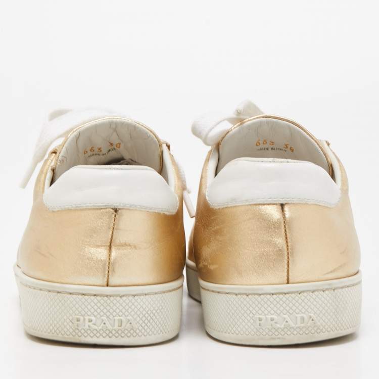Pre Owned Prada Gold/White Leather and Rubber Low Top Sneakers Size 38