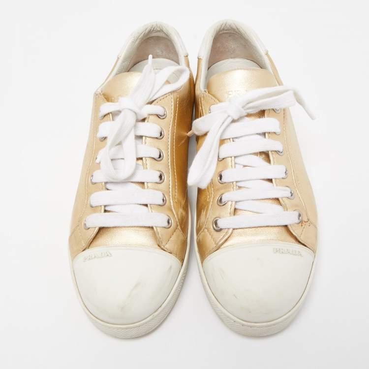 Pre Owned Prada Gold/White Leather and Rubber Low Top Sneakers Size 38