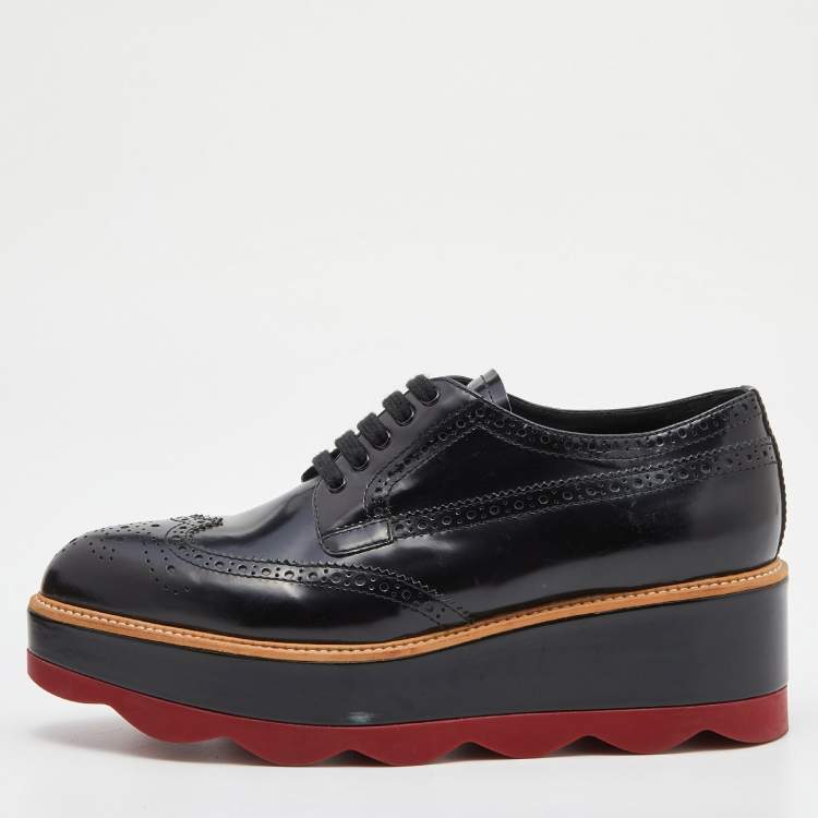 Prada Red Sole Derbies in Black