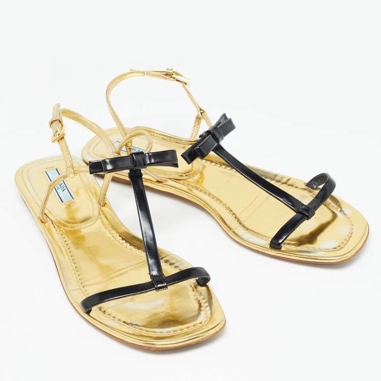 Pre Owned Prada Gold/Black Patent Leather Bow T Strap Flats Size 38.5  