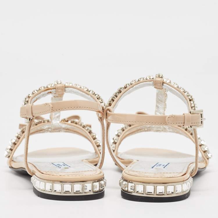 مملوكة مسبقًا Prada Beige Patent Leather Crystal Embellished Bow Ankle Strap Sandals Size 36.5