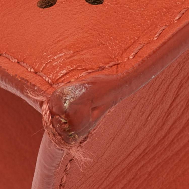 Pre Owned حقيبة كلتش بروينزا شولير جلد مثقبة برتقالية