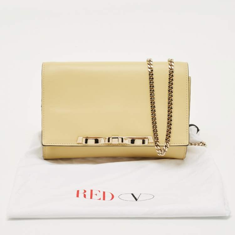 Pre Owned RED Valentino Light Yellow Leather Bow Chain Clutch