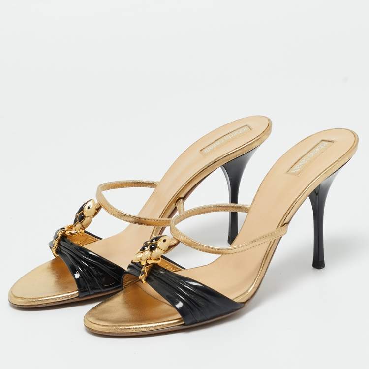 مملوكة مسبقًا Roberto Cavalli Gold/Black Leather and Patent Embellished Brooch Slide Sandals Size 39