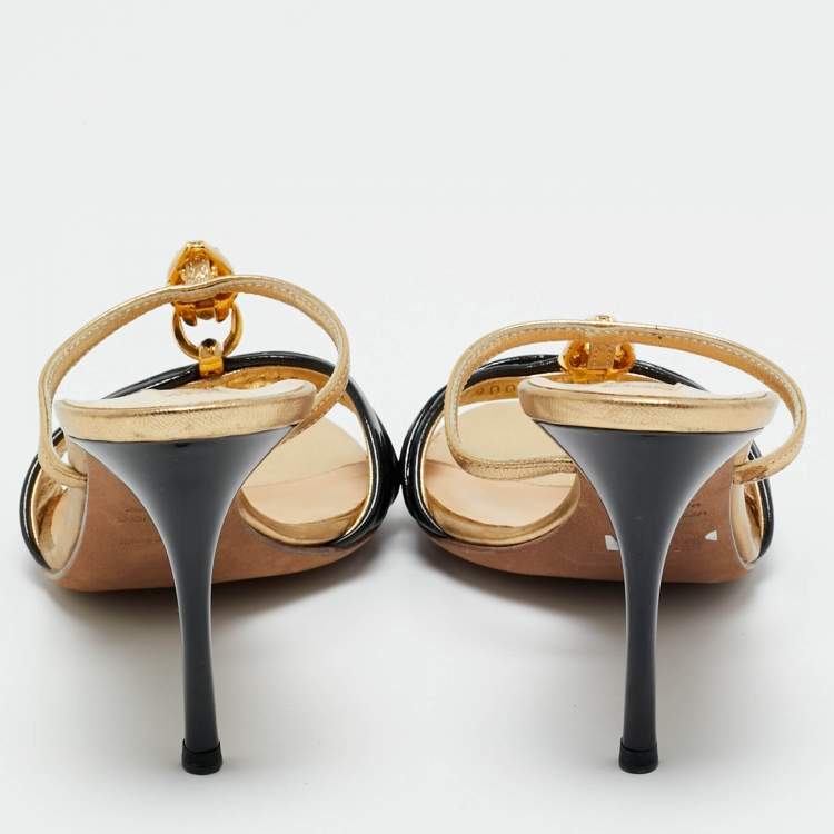 مملوكة مسبقًا Roberto Cavalli Gold/Black Leather and Patent Embellished Brooch Slide Sandals Size 39