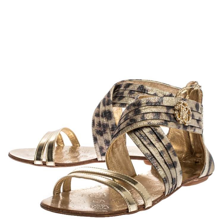 Pre Owned Roberto Cavalli Gold Leopard Print Criss Cross Shimmer Fabric and Leather Crystal Embellished Logo Flat Sandals Size 37