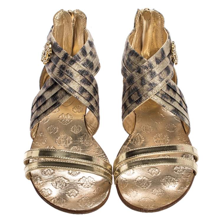 Pre Owned Roberto Cavalli Gold Leopard Print Criss Cross Shimmer Fabric and Leather Crystal Embellished Logo Flat Sandals Size 37