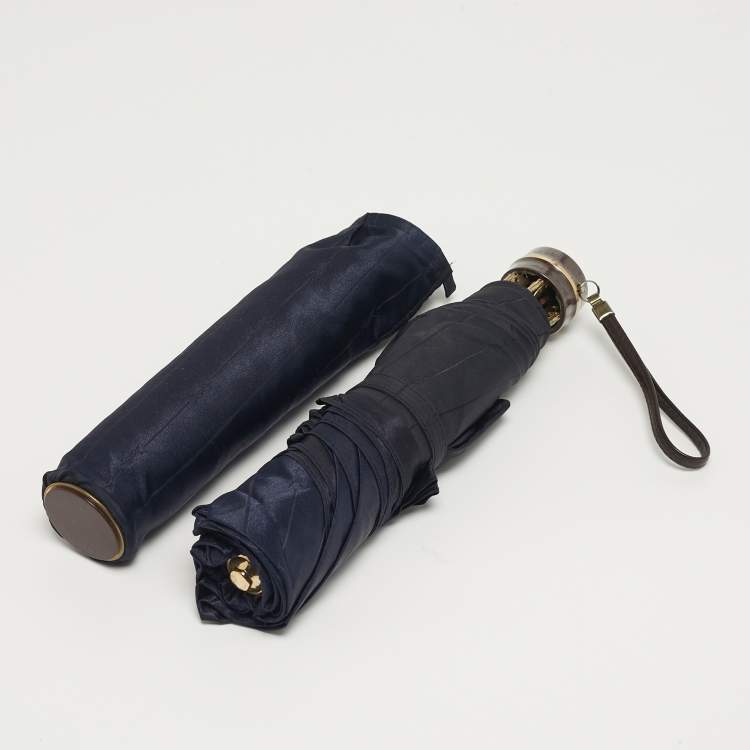 Pre Owned مظلة قابلة للطي سان لوران شعار مقلم أزرق بحري معدن ونيلون