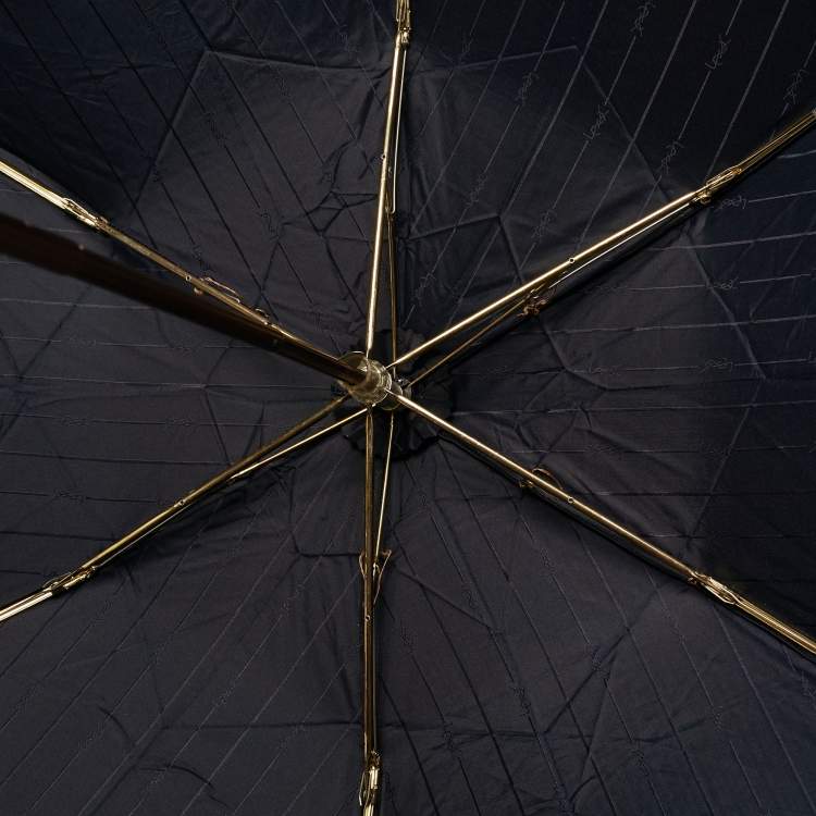 Pre Owned مظلة قابلة للطي سان لوران شعار مقلم أزرق بحري معدن ونيلون