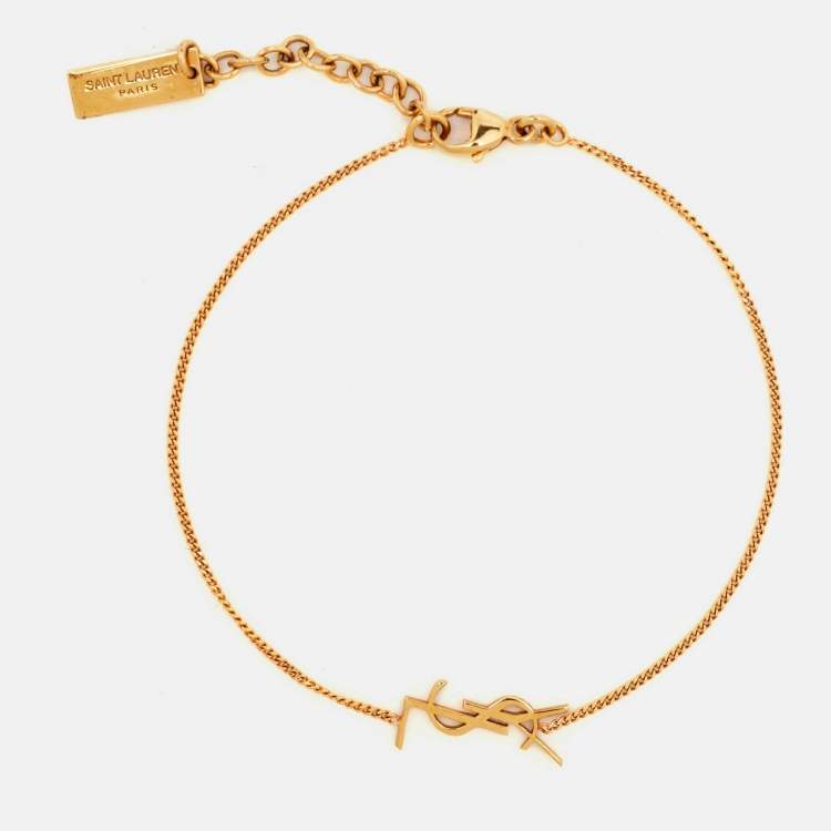 Pre Owned Saint Laurent Paris Cassandre Charm Gold Tone Bracelet