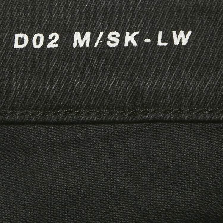 Pre Owned بنطلون جينز ممزق سان لوران باريس دينم أسود مقاس وسط 30 بوصة