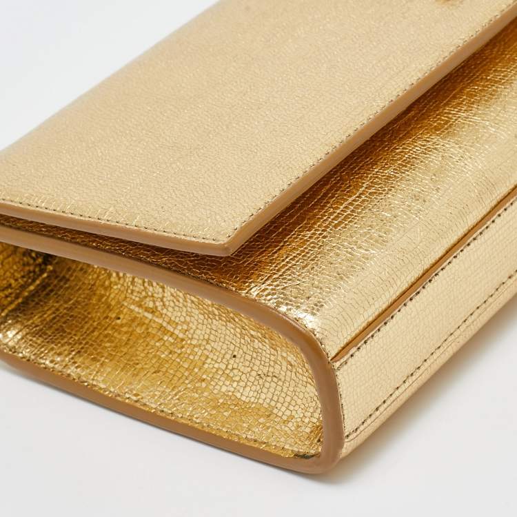 Pre Owned Saint Laurent Gold Leather Cassandre Clutch