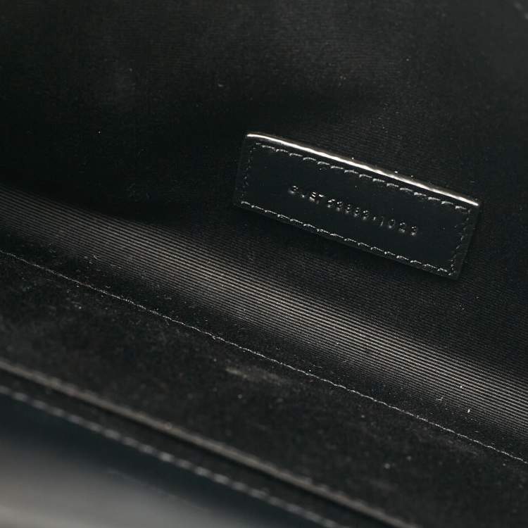مملوكة مسبقًا Saint Laurent Black Patent Leather Cassandre Flap Wristlet Clutch