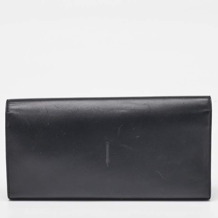 Pre Owned Saint Laurent Black Leather Cassandre Tassel Flap Clutch