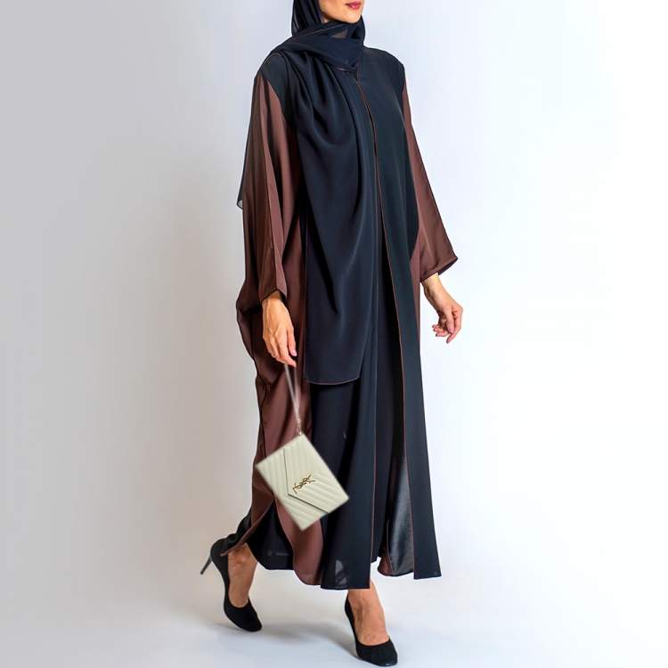 Pre Owned Saint Laurent Off White Matelasse Leather Cassandre Wristlet Clutch