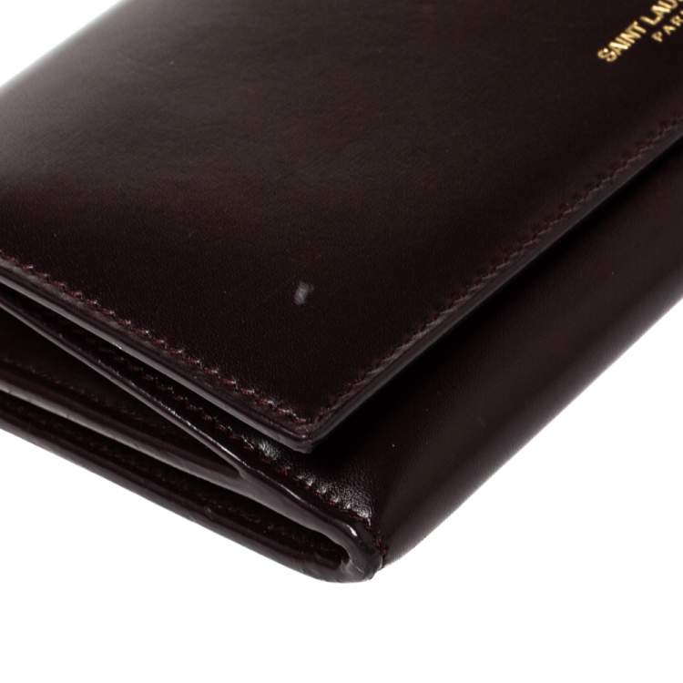 Pre Owned Saint Laurent Burgundy Leather Marquage Continental Flap Wallet