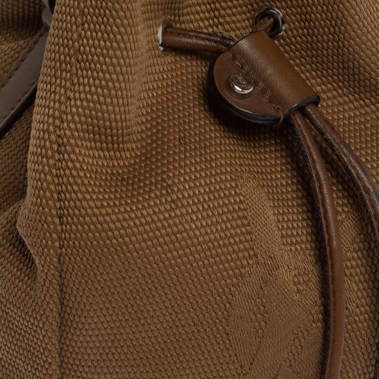 Pre Owned Yves Saint Laurent Light Brown Logo Embossed Canvas Vintage Drawstring Bag