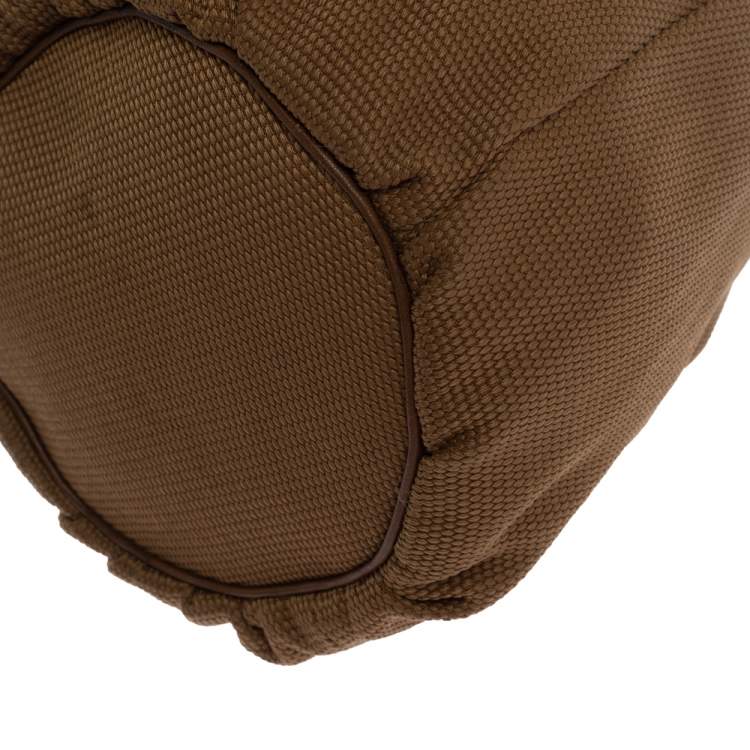 Pre Owned Yves Saint Laurent Light Brown Logo Embossed Canvas Vintage Drawstring Bag