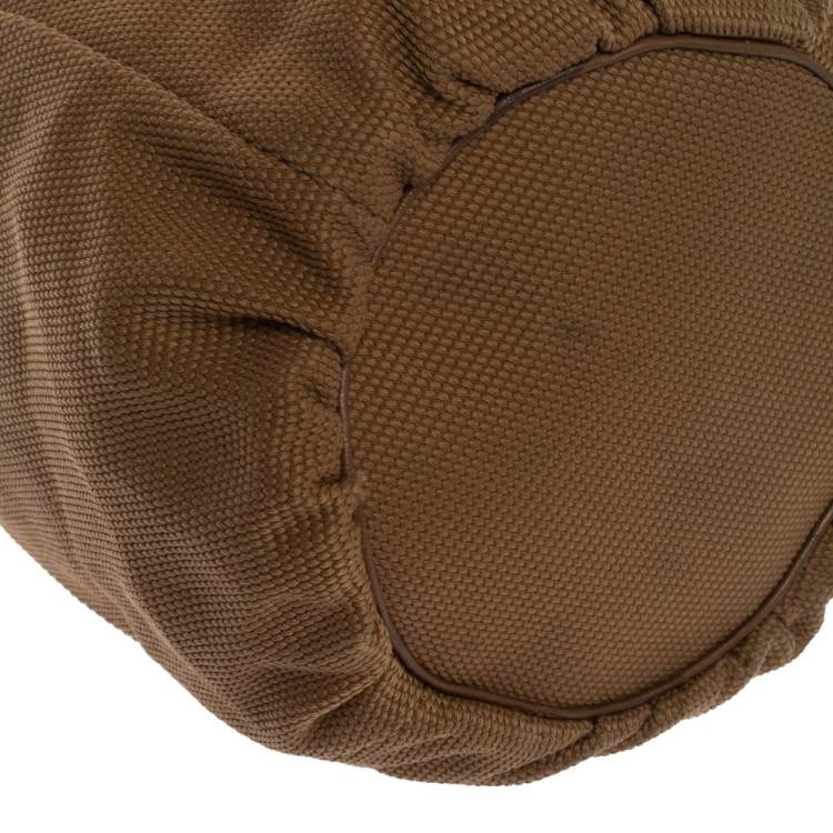 Pre Owned Yves Saint Laurent Light Brown Logo Embossed Canvas Vintage Drawstring Bag