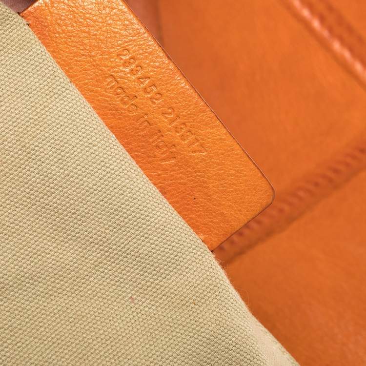 Pre Owned Yves Saint Laurent Orange Leather Charms Tote