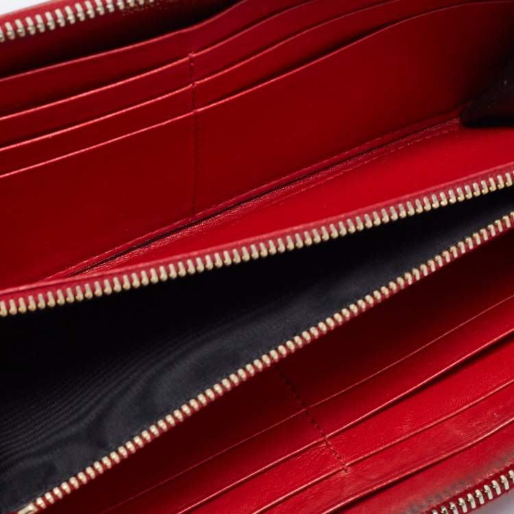 مملوكة مسبقًا Saint Laurent Red Patent Leather Zip Around Wallet