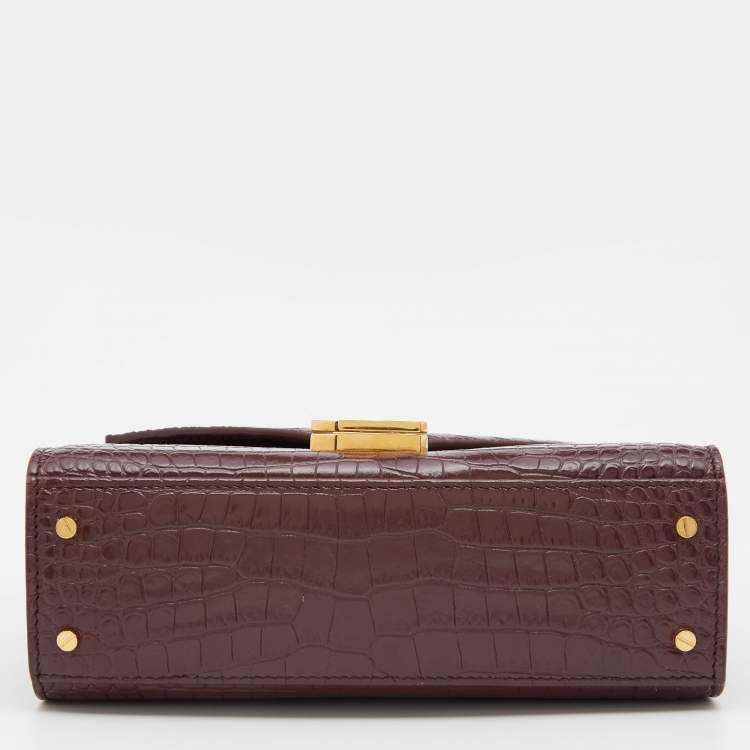 Pre Owned Saint Laurent Burgundy Croc Embossed Leather Mini Cassandra Top Handle Bag