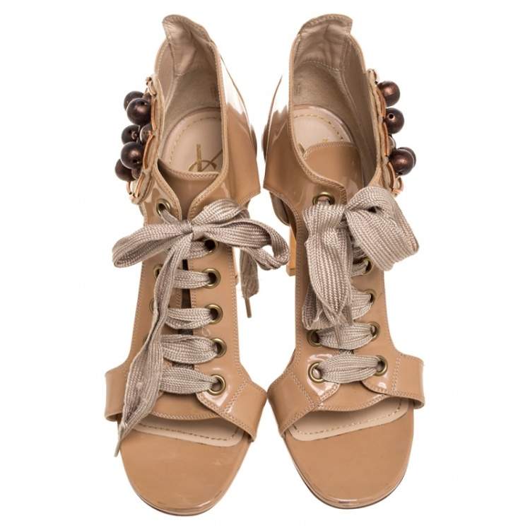 Pre Owned Saint Laurent Beige Patent Leather Embellished Lace Up Booties Size 39