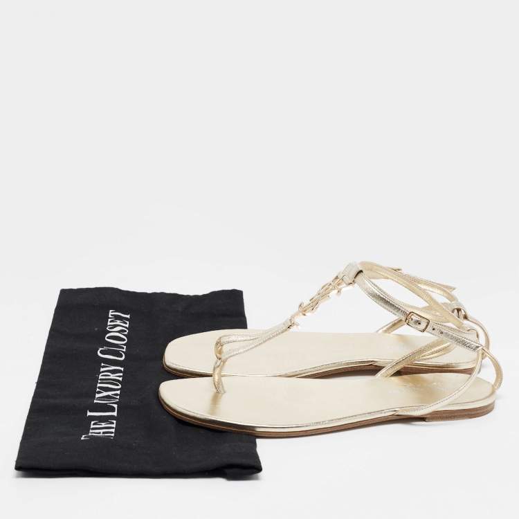 Pre Owned Saint Laurent Gold Leather Cassandra Flat Ankle Strap Sandals Size 38