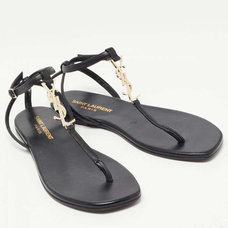 Pre Owned Saint Laurent Black Leather Logo T Bar Ankle Strap Flat Sandals Size 35