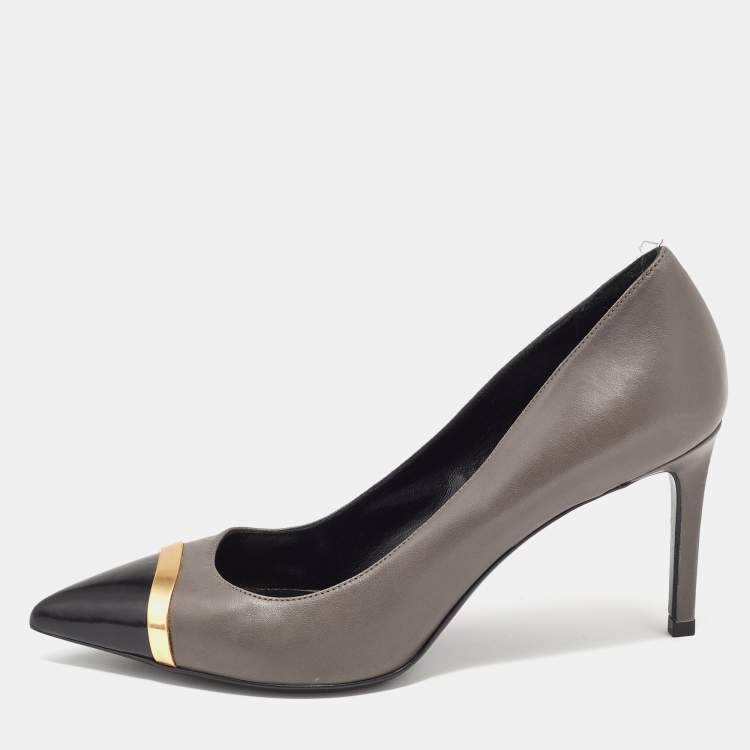 Pair of gray pointed-toe platform pumps with silver studs, Court