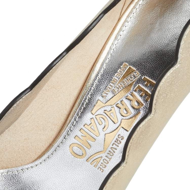 Pre Owned Salvatore Ferragamo Gold Leather Carla Vara Bow Pump Size 37
