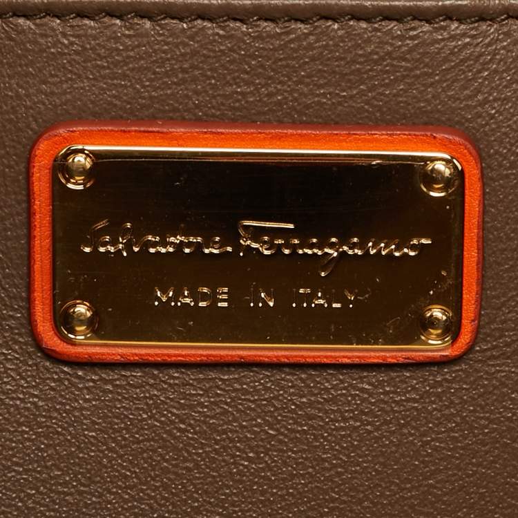 Pre Owned Salvatore Ferragamo Orange Leather Afef Lock Story Wristlet Clutch