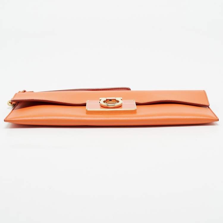 Pre Owned Salvatore Ferragamo Orange Leather Afef Lock Story Wristlet Clutch