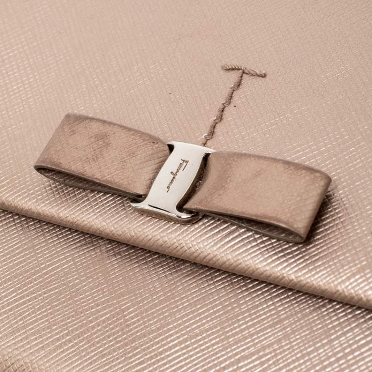 Pre Owned Salvatore Ferragamo Beige Metallic Leather Bow Continental Wallet