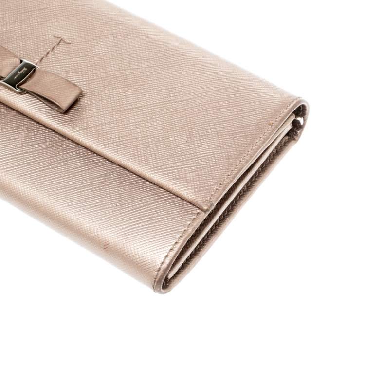 Pre Owned Salvatore Ferragamo Beige Metallic Leather Bow Continental Wallet