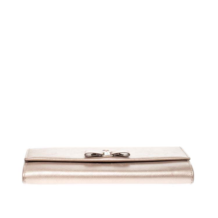 Pre Owned Salvatore Ferragamo Beige Metallic Leather Bow Continental Wallet