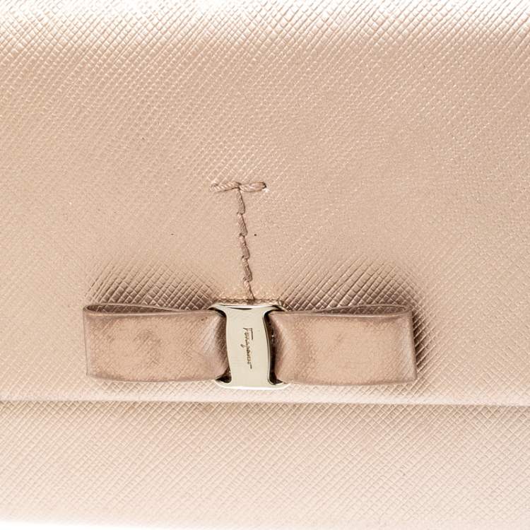 Pre Owned Salvatore Ferragamo Beige Metallic Leather Bow Continental Wallet