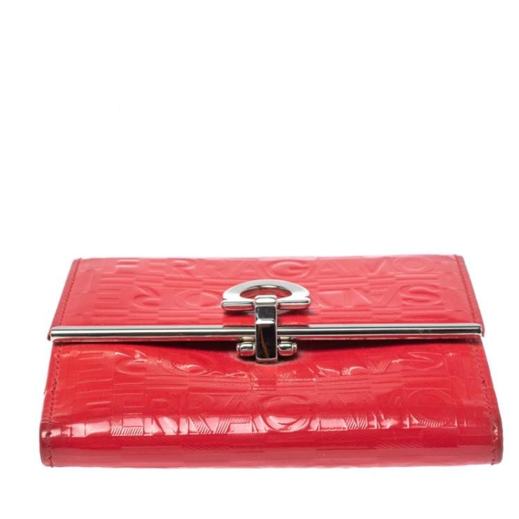 Pre Owned Salvatore Ferragamo Pink Monogram Embossed Patent Leather Gancini Triifold Wallet