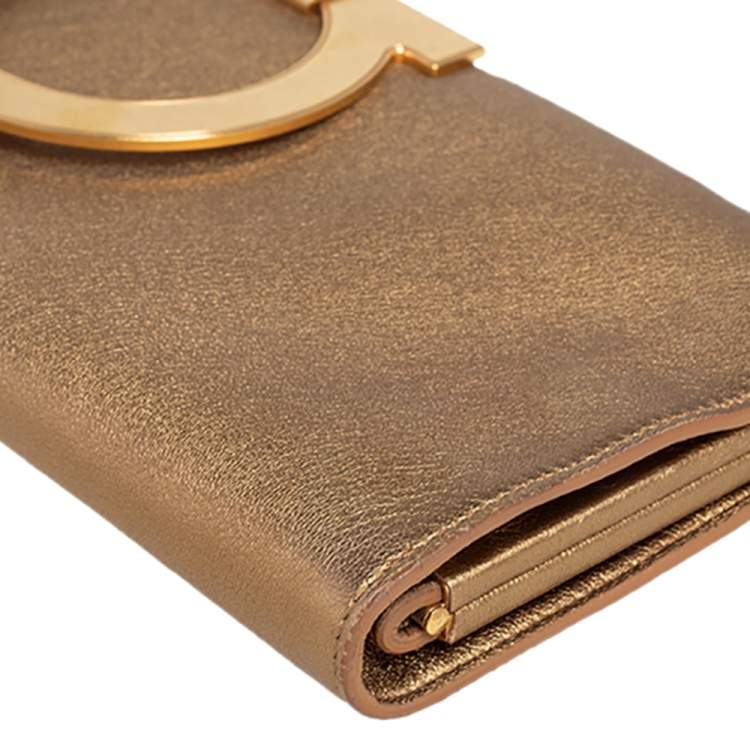 Pre Owned Salvatore Ferragamo Metallic Gold Leather Musa Gancini Clutch