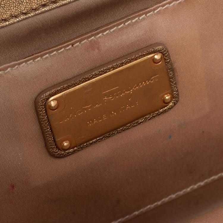Pre Owned Salvatore Ferragamo Metallic Gold Leather Musa Gancini Clutch