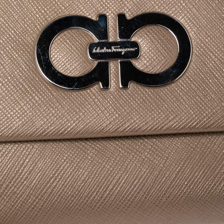 Pre Owned Salvatore Ferragamo Gold Leather Double Gancio Flap Compact Wallet