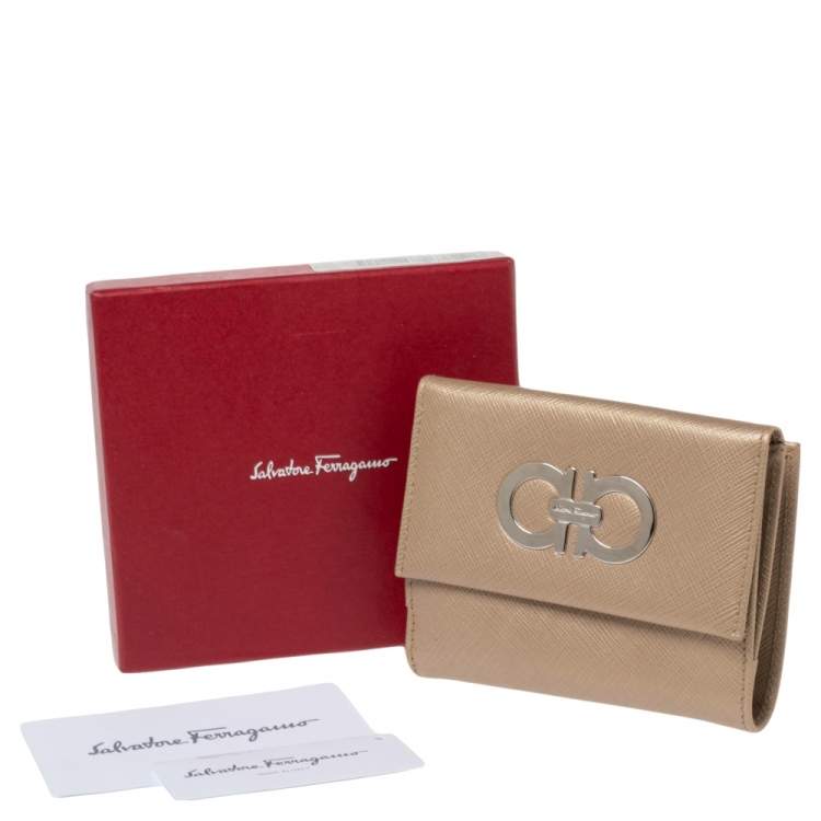 Pre Owned Salvatore Ferragamo Gold Leather Double Gancio Flap Compact Wallet
