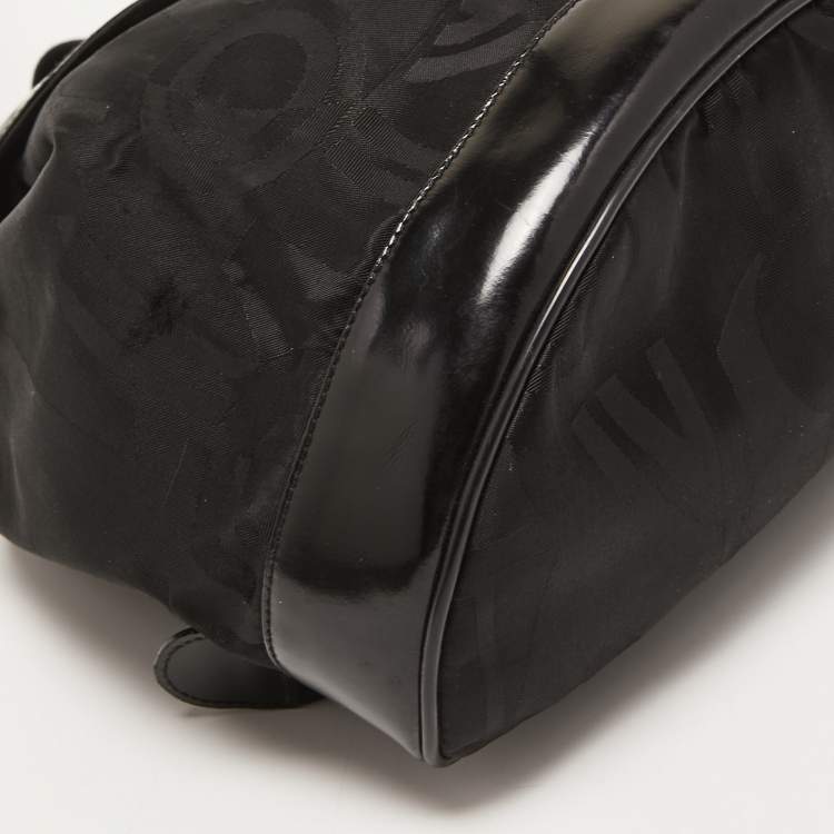 Pre Owned Salvatore Ferragamo Black Printed Nylon and Glossy Leather Buckle Flap Backpack