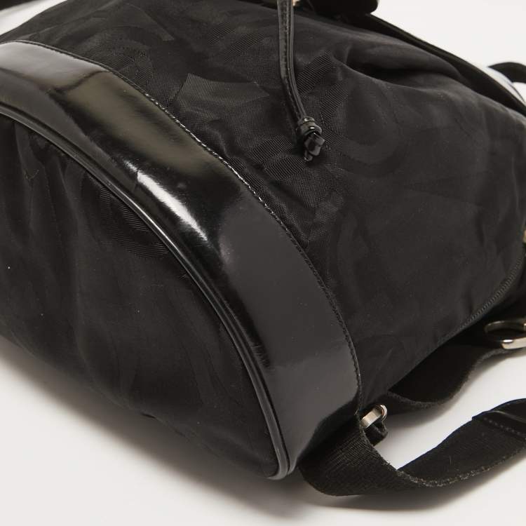 Pre Owned Salvatore Ferragamo Black Printed Nylon and Glossy Leather Buckle Flap Backpack