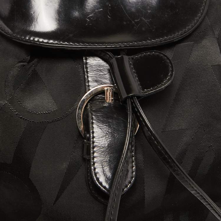 Pre Owned Salvatore Ferragamo Black Printed Nylon and Glossy Leather Buckle Flap Backpack