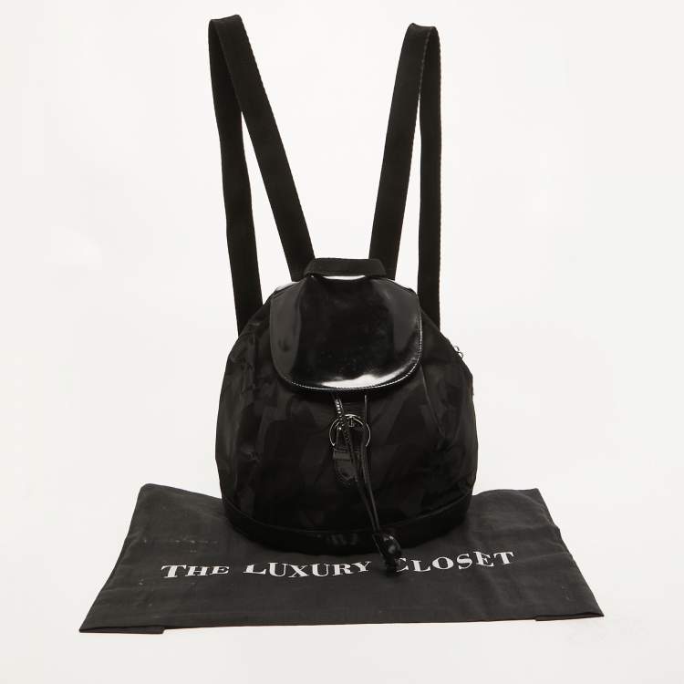 Pre Owned Salvatore Ferragamo Black Printed Nylon and Glossy Leather Buckle Flap Backpack