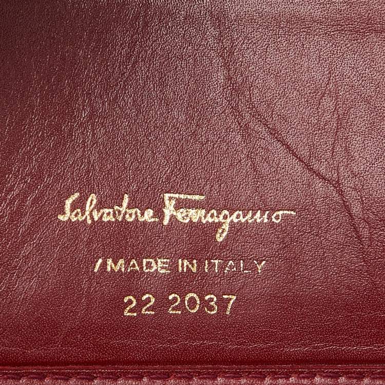 Pre Owned Salvatore Ferragamo Burgundy Leather Gancini Flap Compact Wallet
