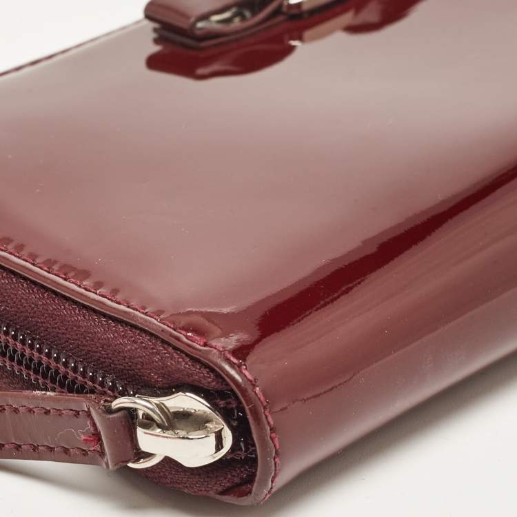Pre Owned Salvatore Ferragamo Burgundy Patent Leather Vara Bow Zip Around Wallet