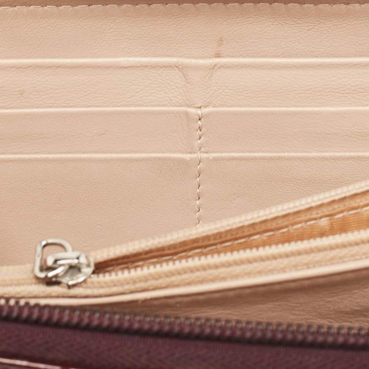 Pre Owned Salvatore Ferragamo Burgundy Patent Leather Vara Bow Zip Around Wallet